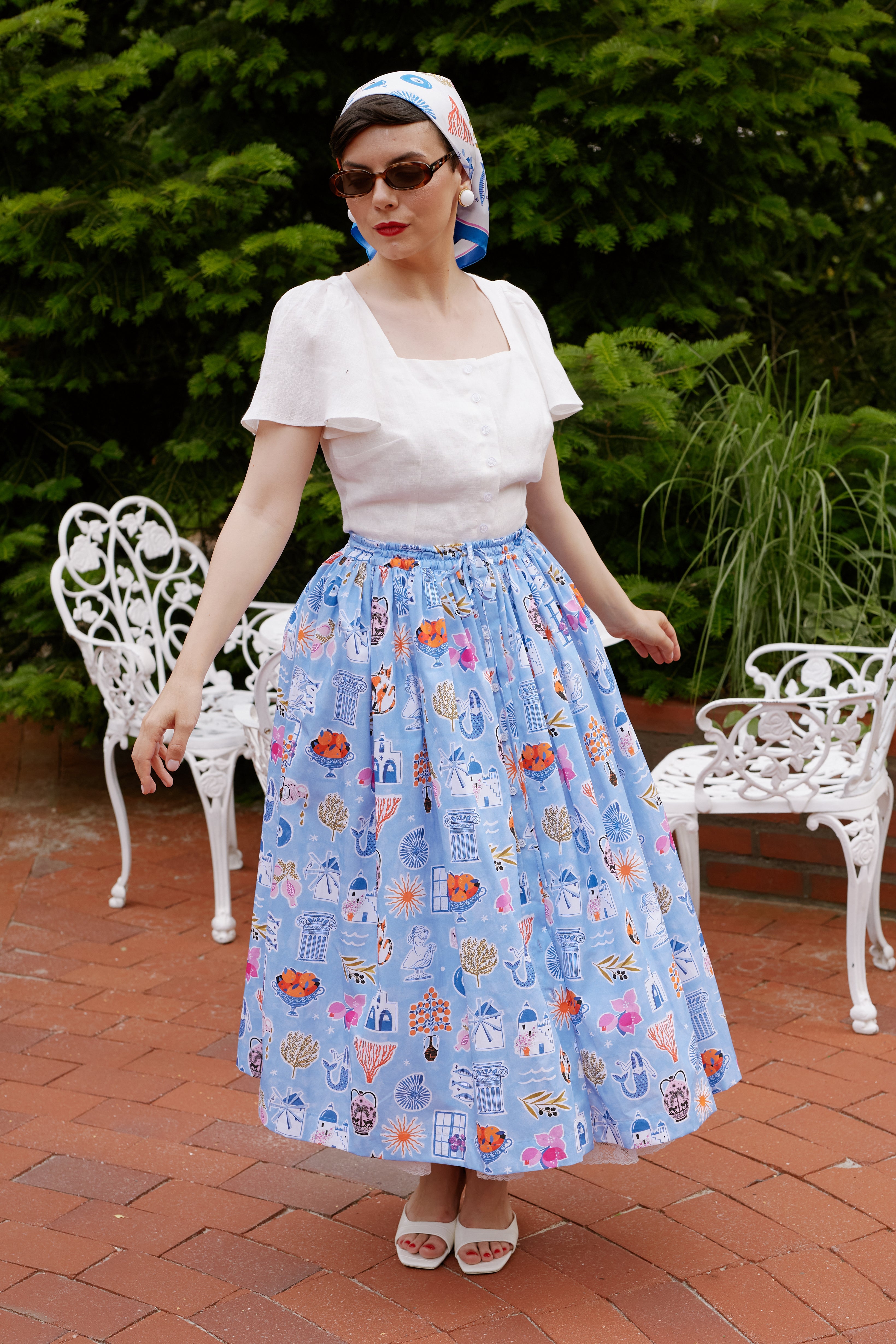 White linen midi skirt with ruffles and crocheted lace