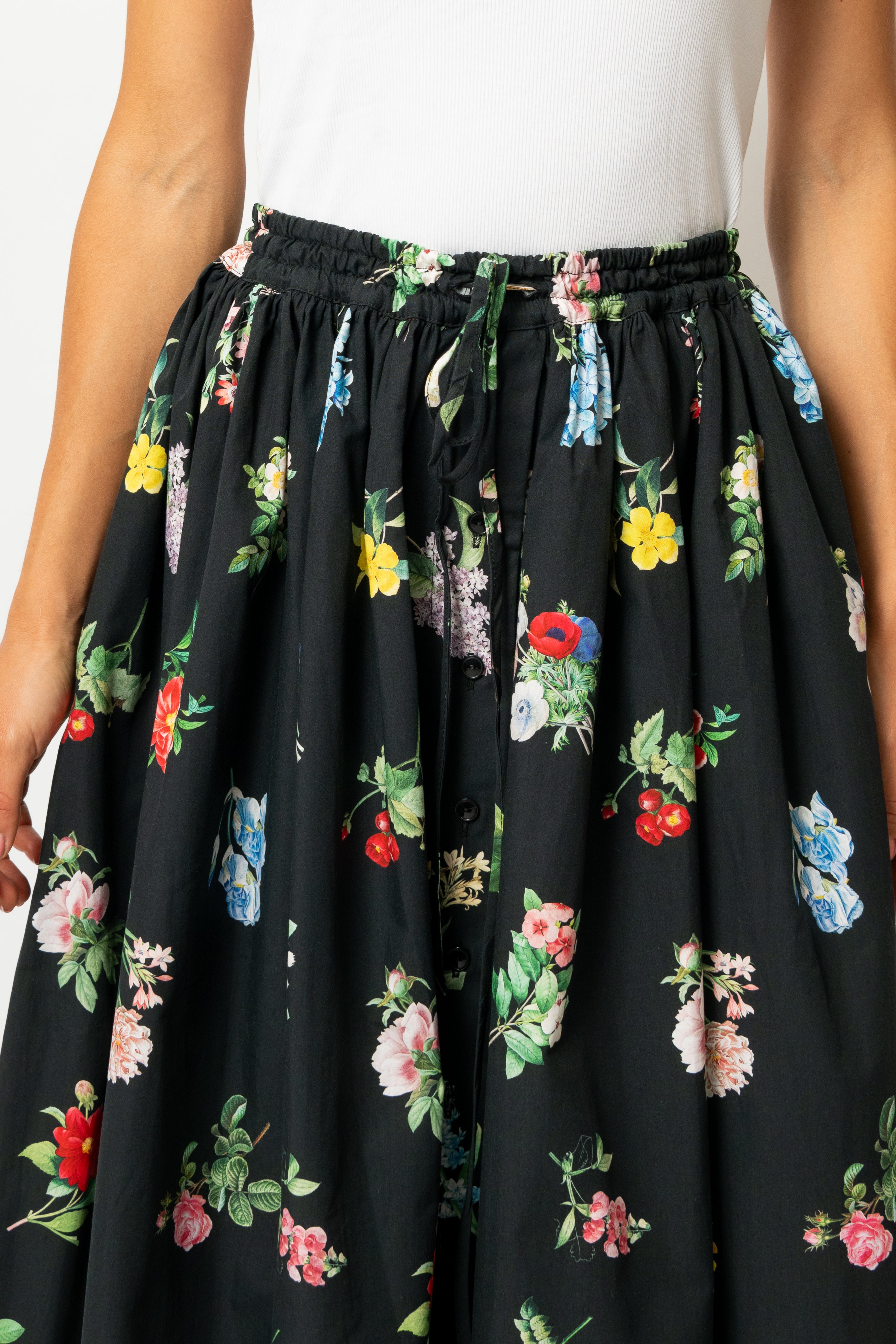 White linen midi skirt with ruffles and crocheted lace