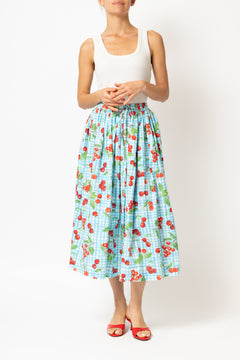 White linen midi skirt with ruffles and crocheted lace