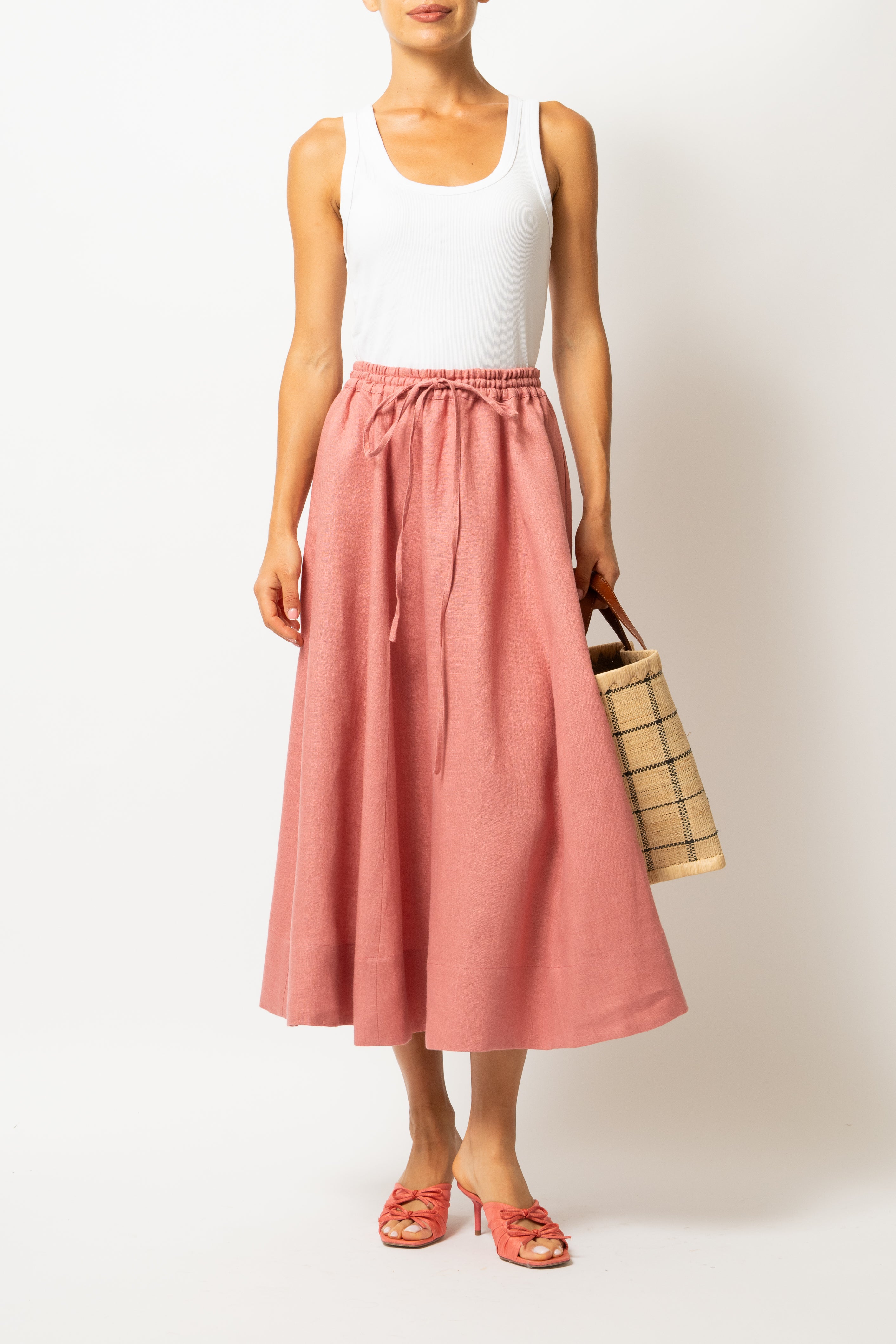 White linen midi skirt with ruffles and crocheted lace