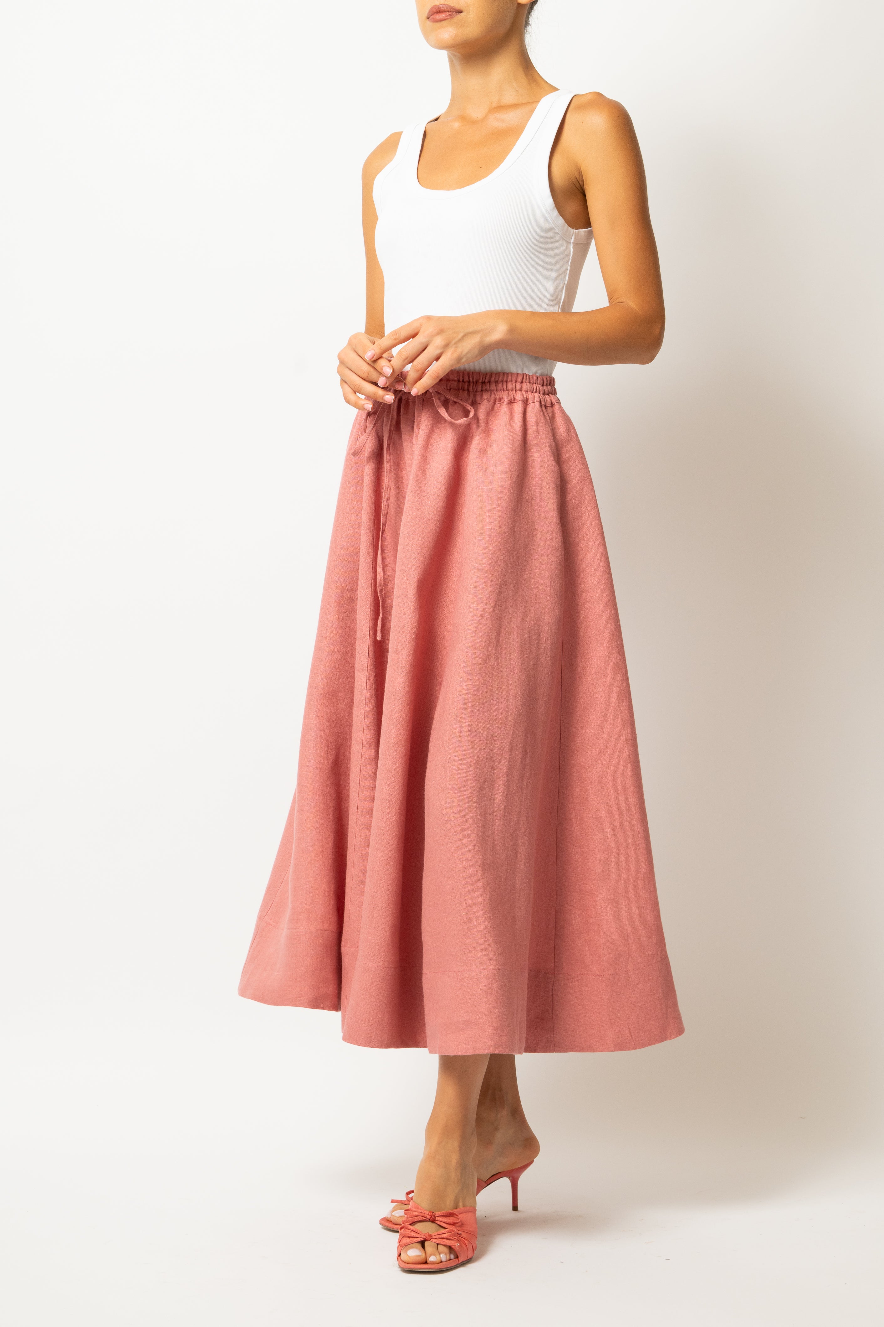White linen midi skirt with ruffles and crocheted lace