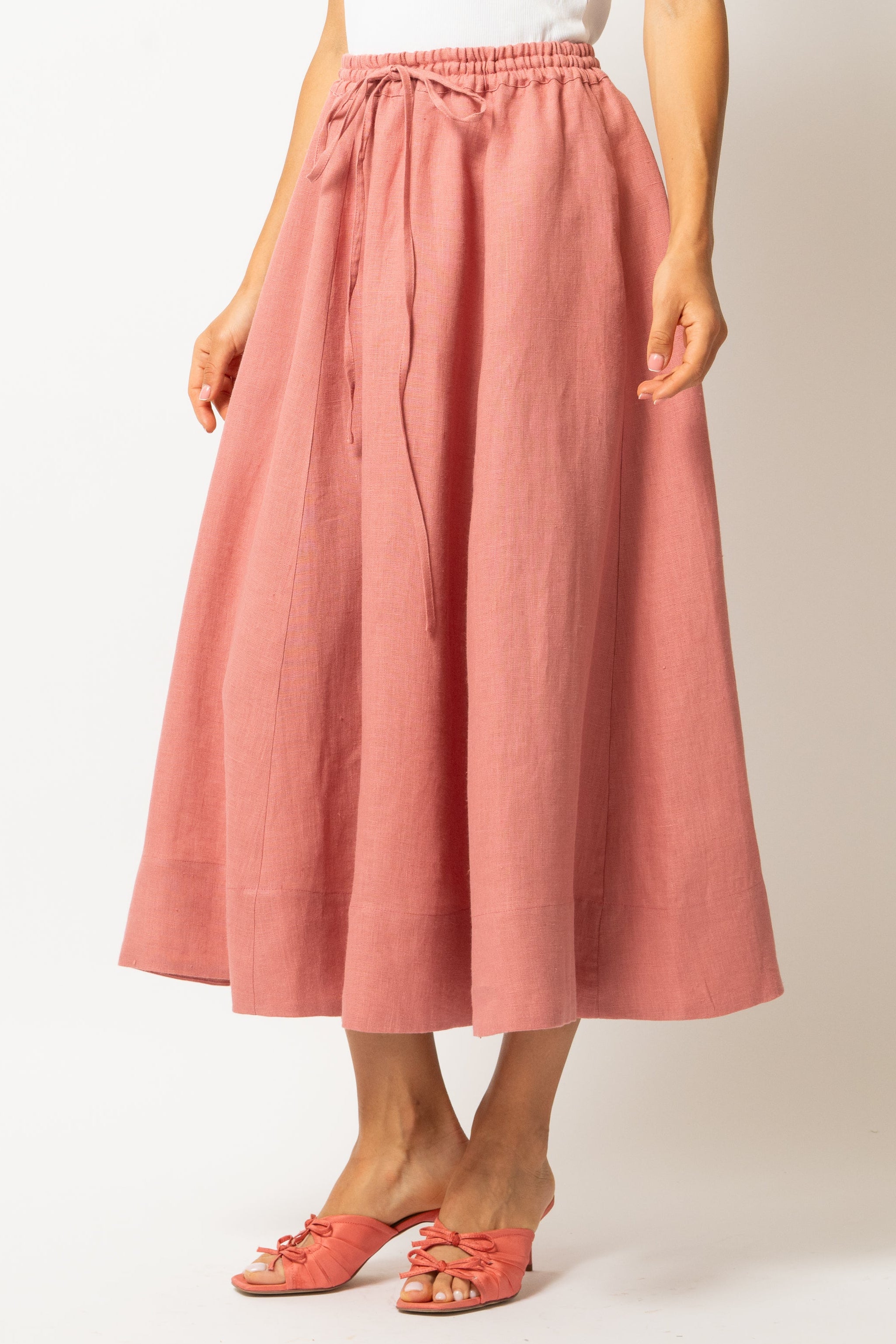 White linen midi skirt with ruffles and crocheted lace