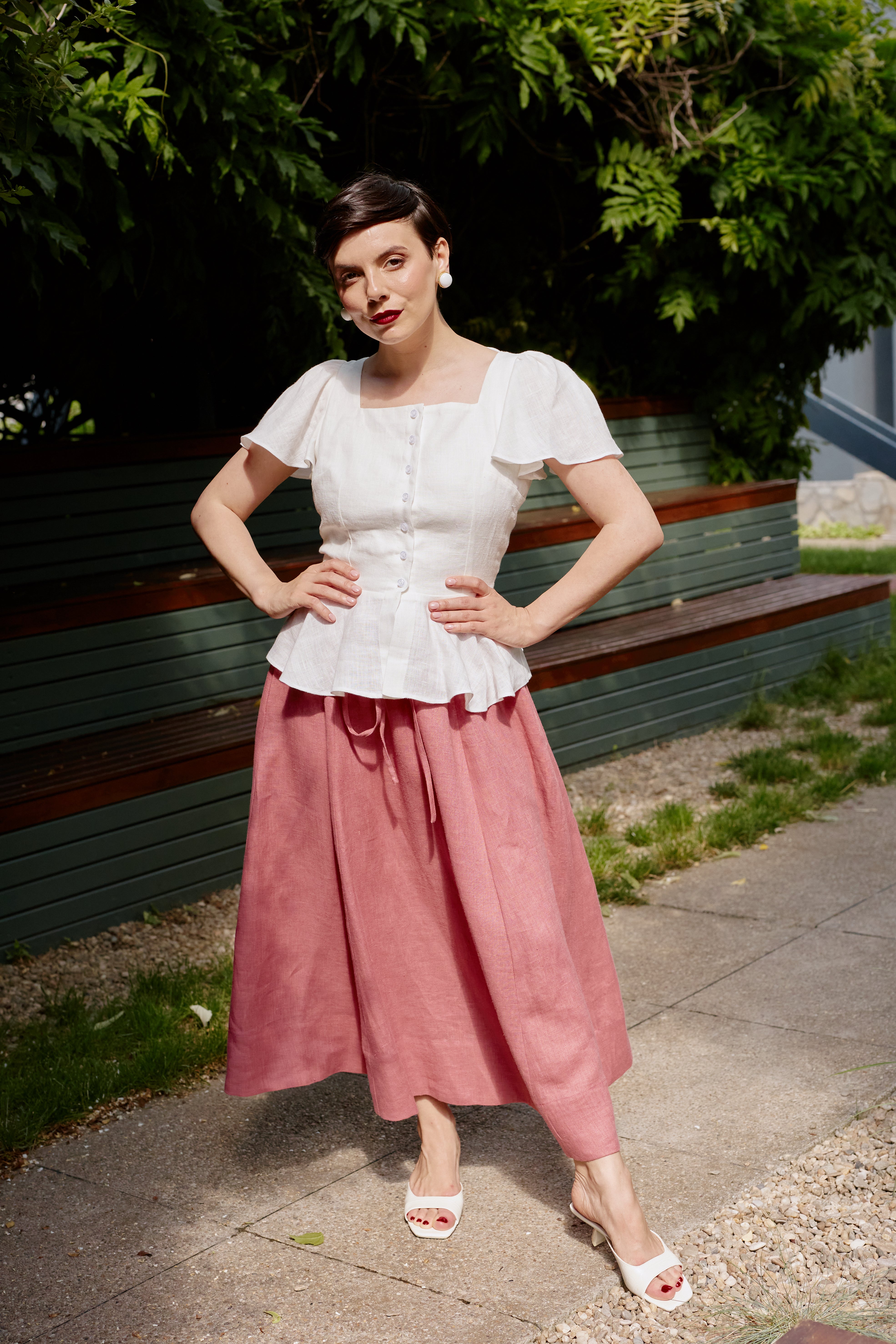 White linen midi skirt with ruffles and crocheted lace
