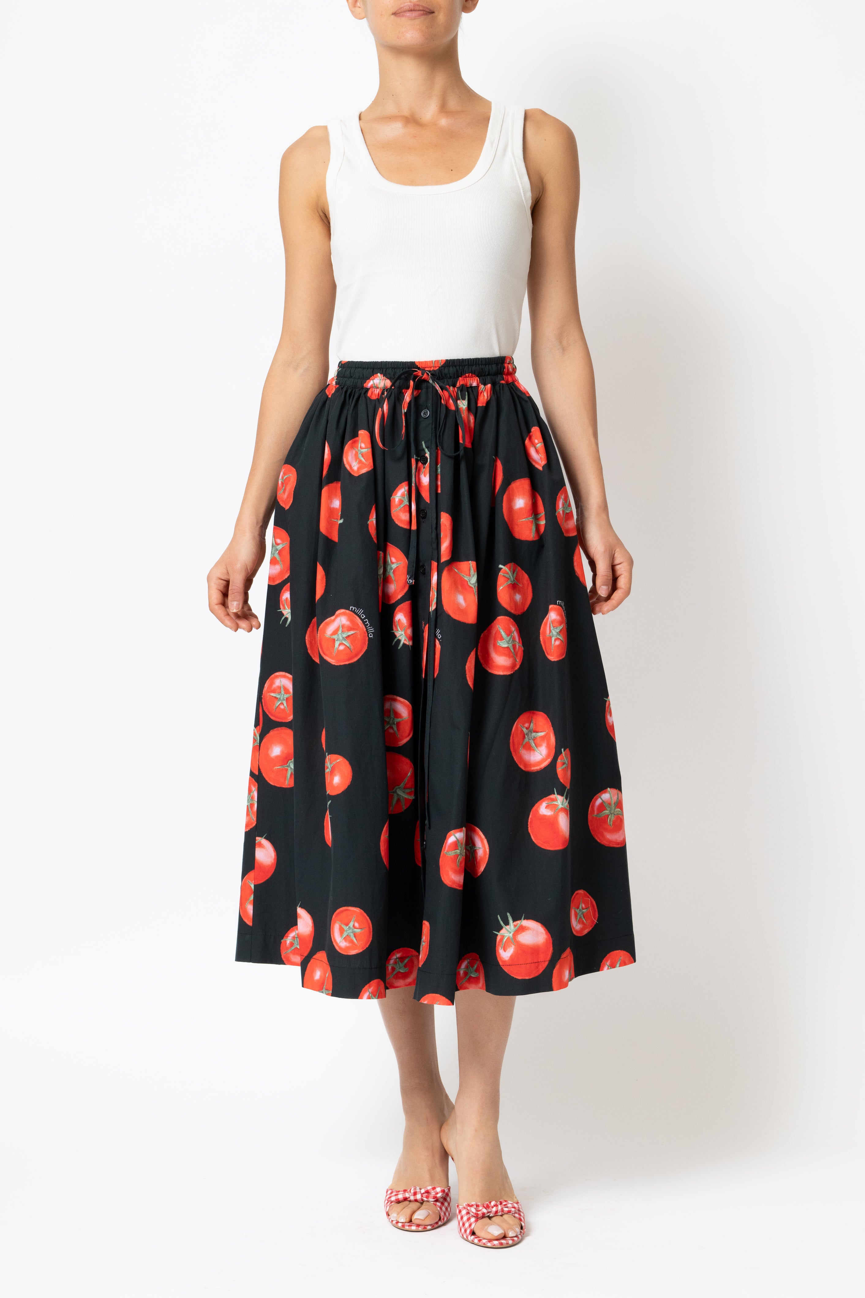 White linen midi skirt with ruffles and crocheted lace