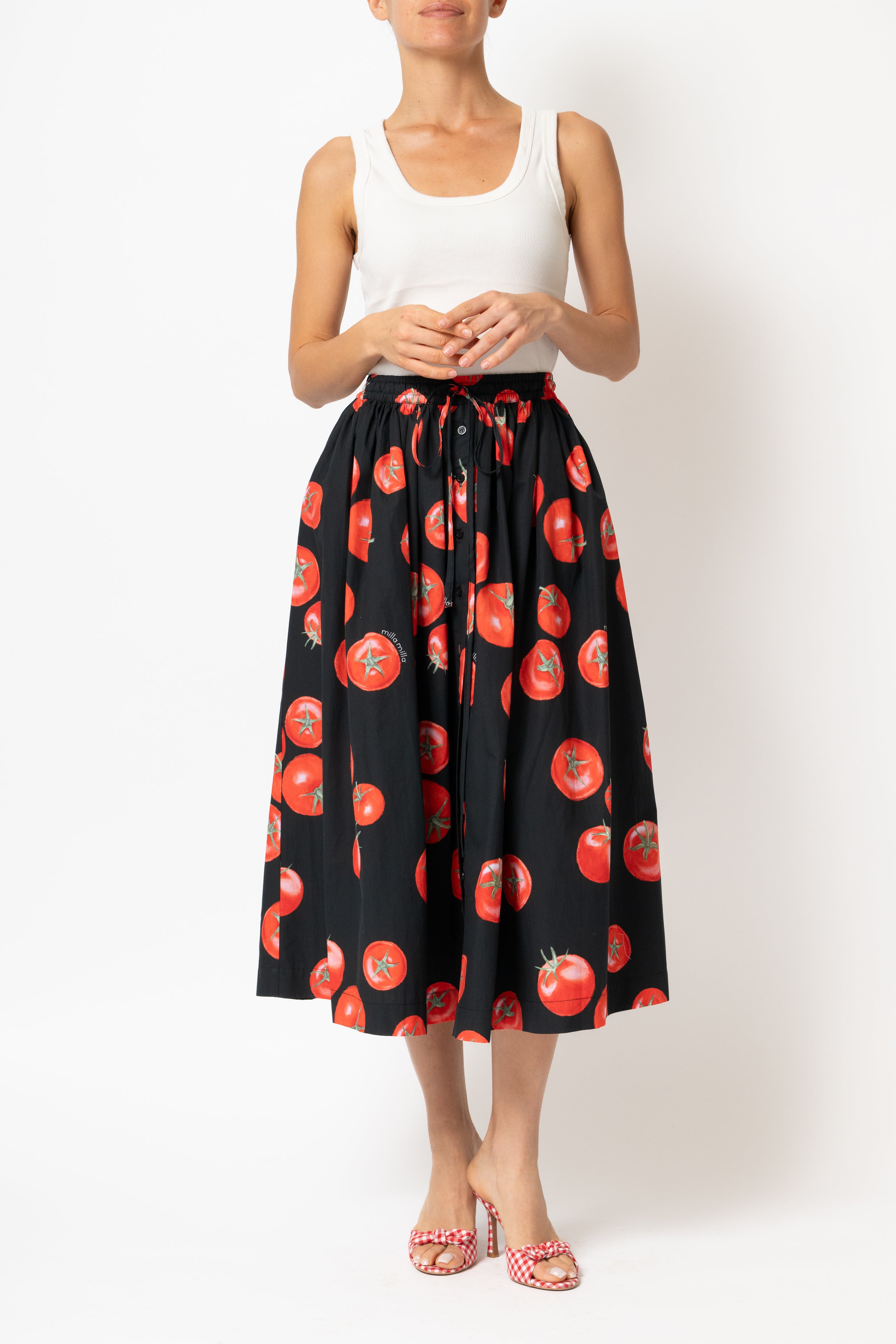 White linen midi skirt with ruffles and crocheted lace