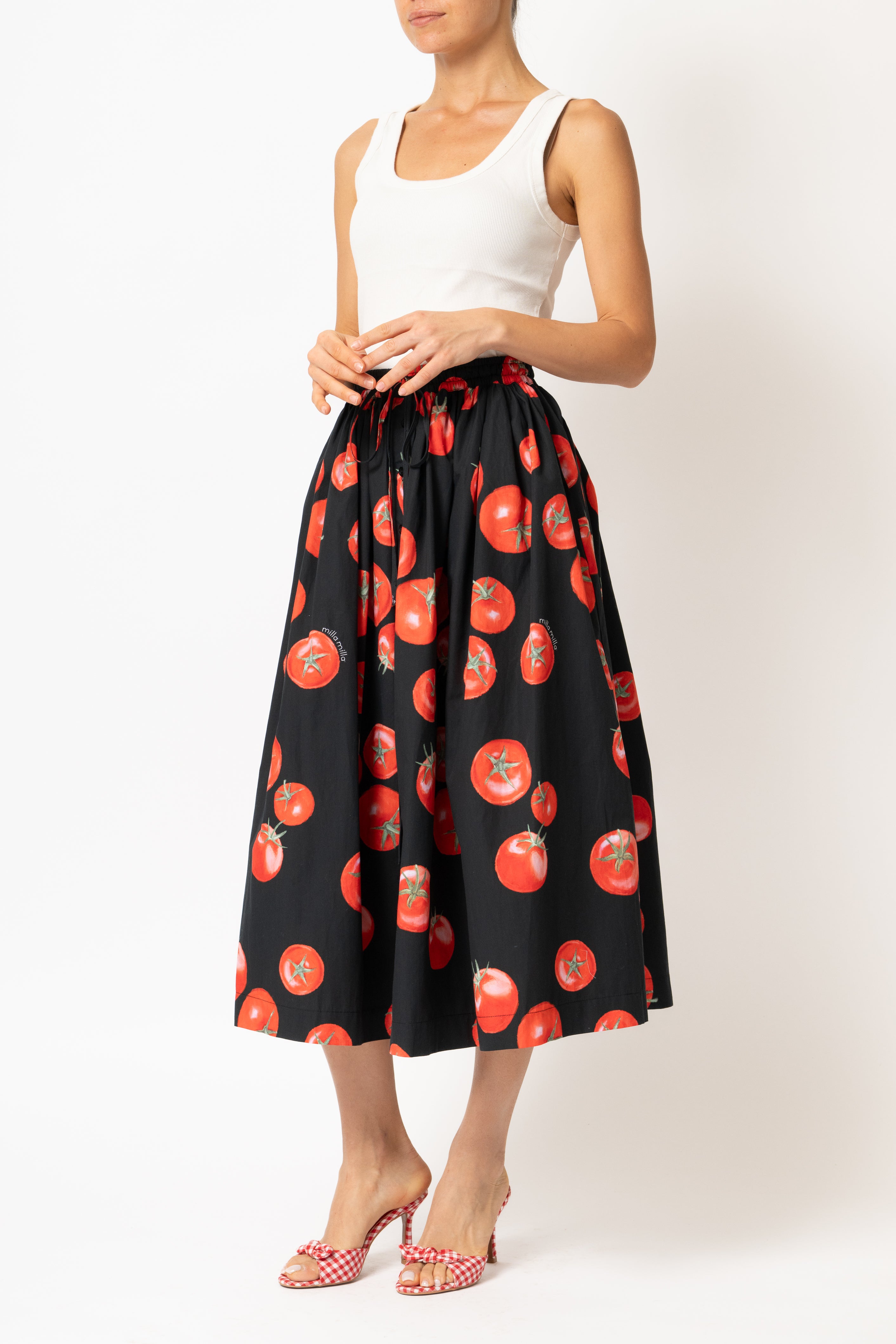 White linen midi skirt with ruffles and crocheted lace