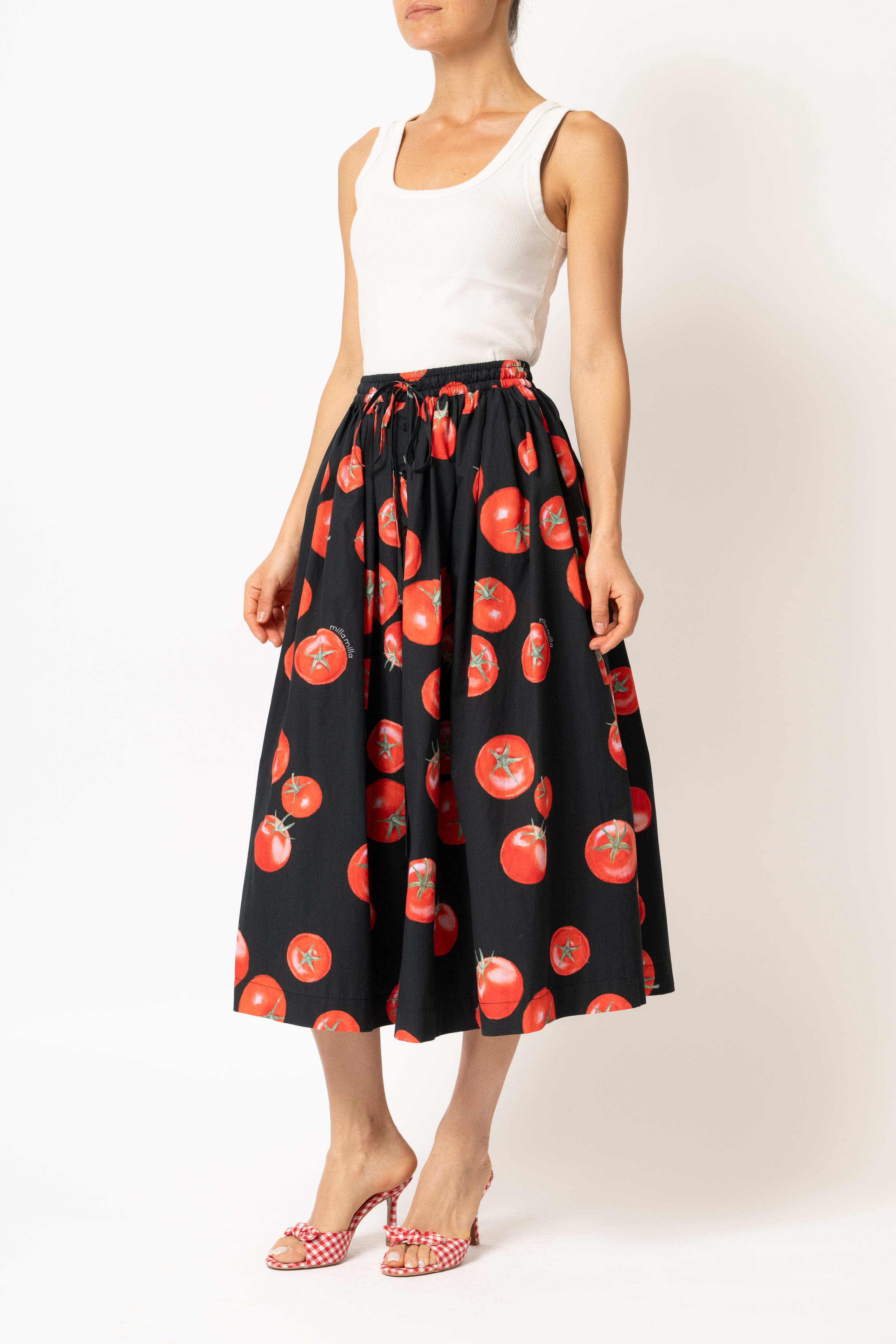White linen midi skirt with ruffles and crocheted lace