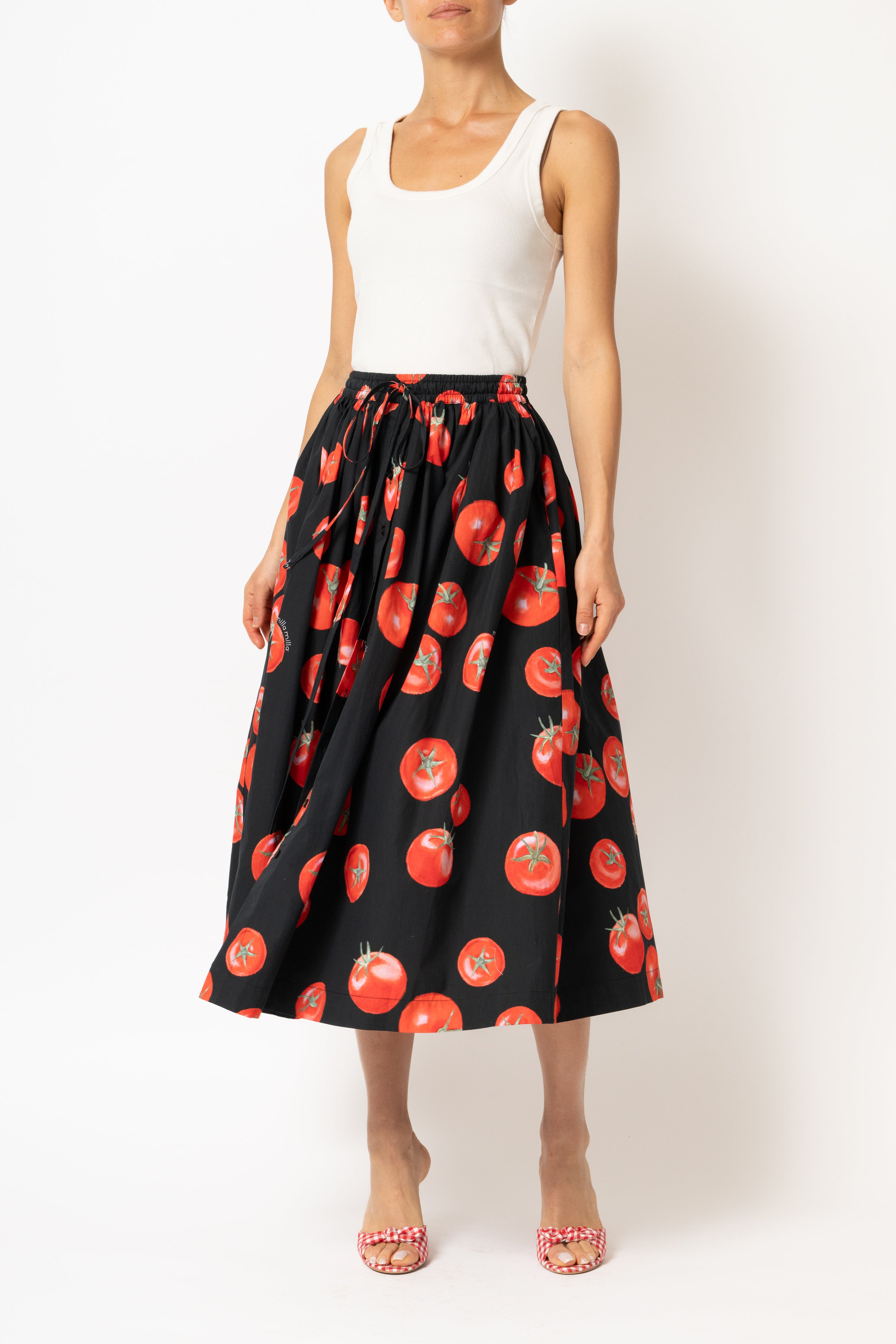 White linen midi skirt with ruffles and crocheted lace