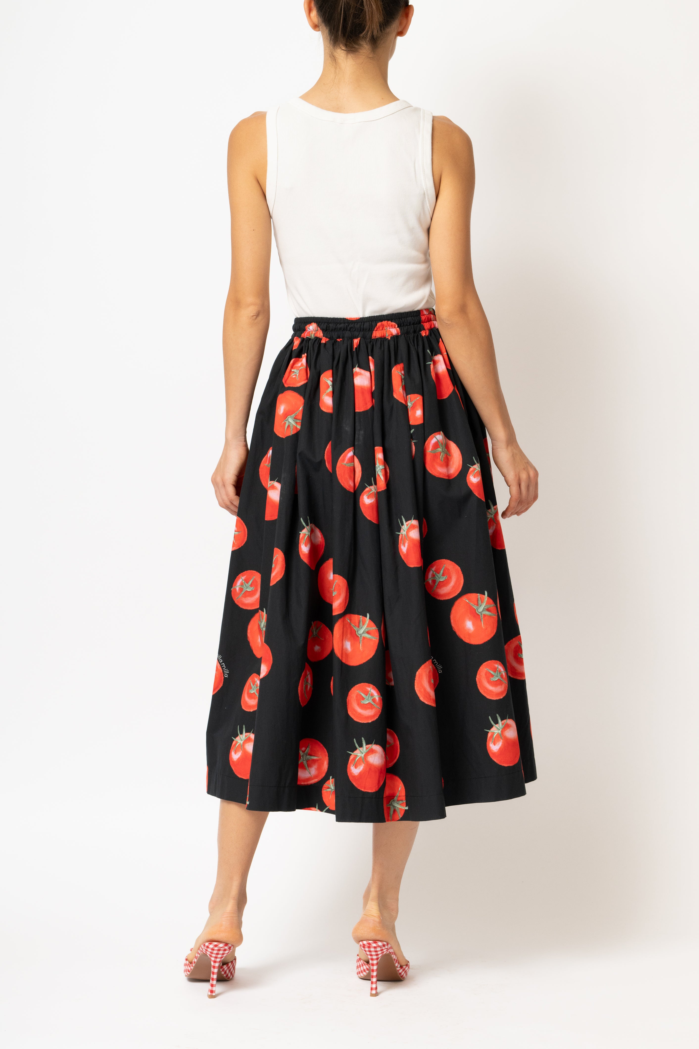 White linen midi skirt with ruffles and crocheted lace