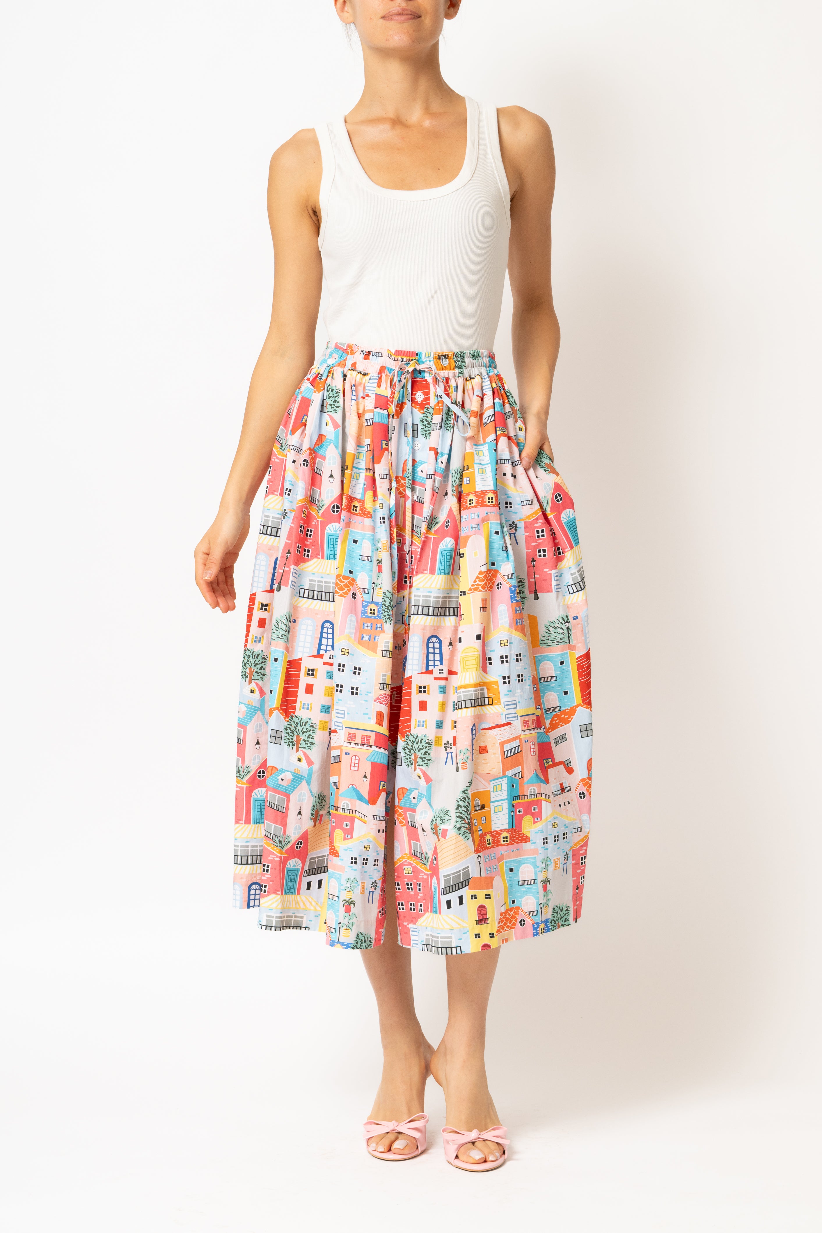 White linen midi skirt with ruffles and crocheted lace