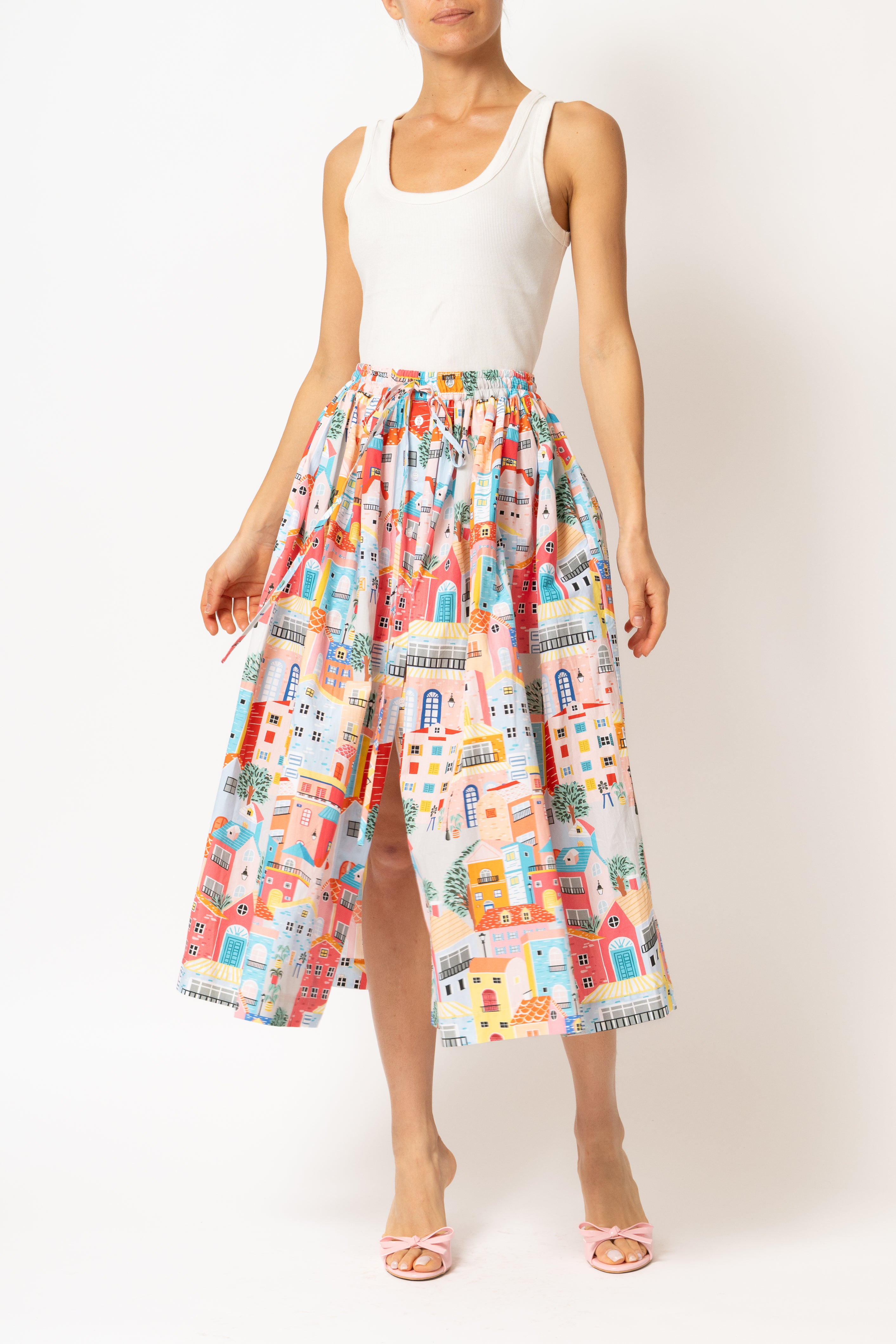 White linen midi skirt with ruffles and crocheted lace