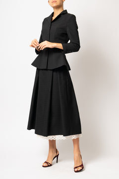 Wide midi skirt made of black wool fabric with ecru lace