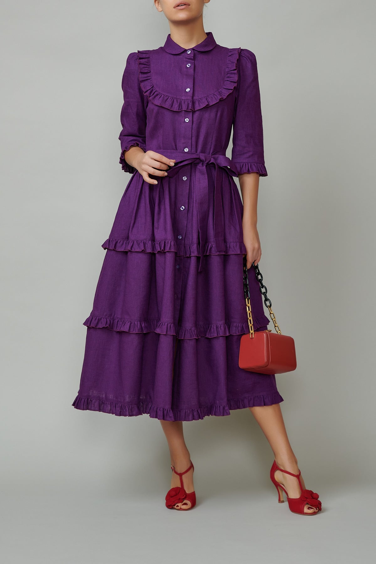 Shirt dress with round placket and ruffles, made of purple linen
