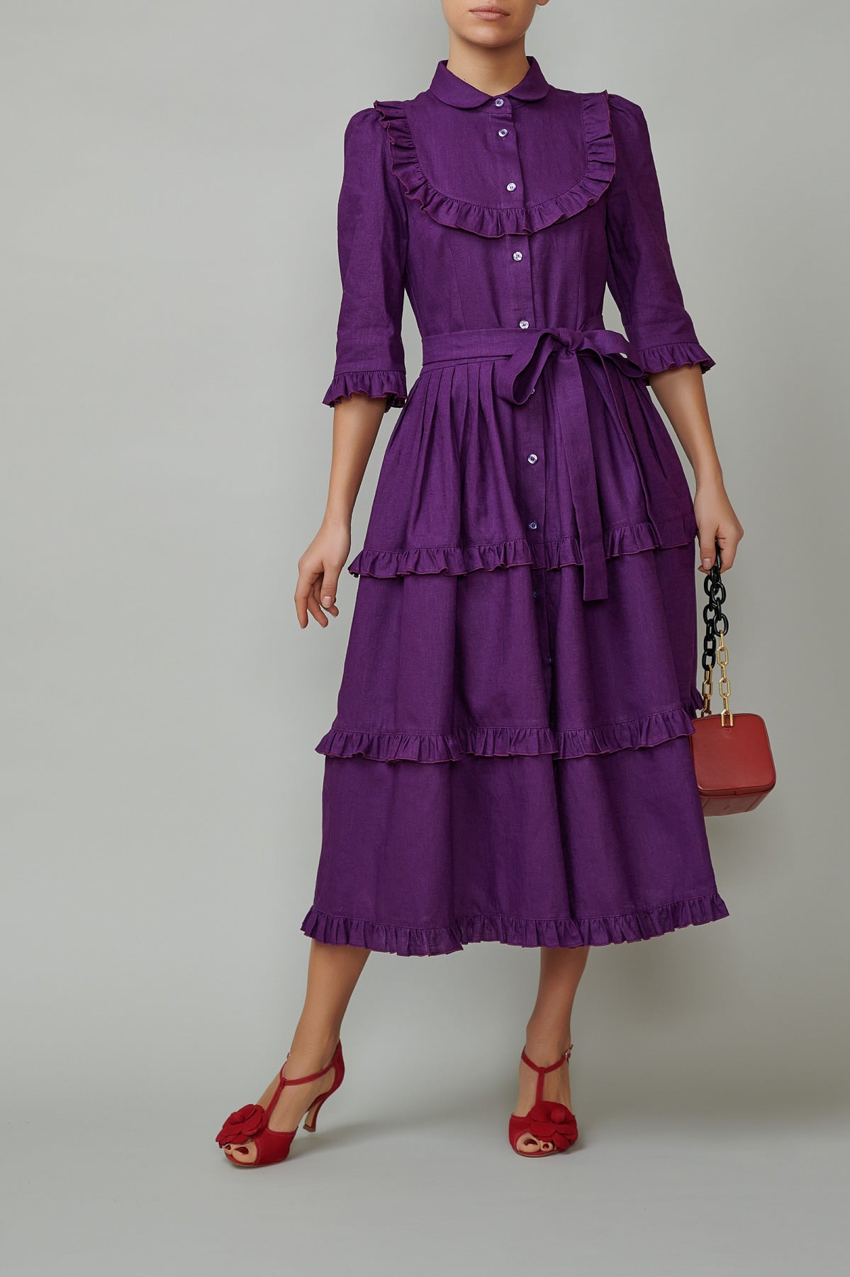 Shirt dress with round placket and ruffles, made of purple linen