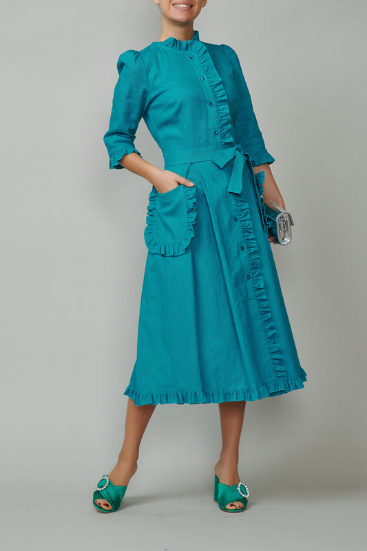 Shirt dress with applied pockets and ruffles, made of turquoise leather