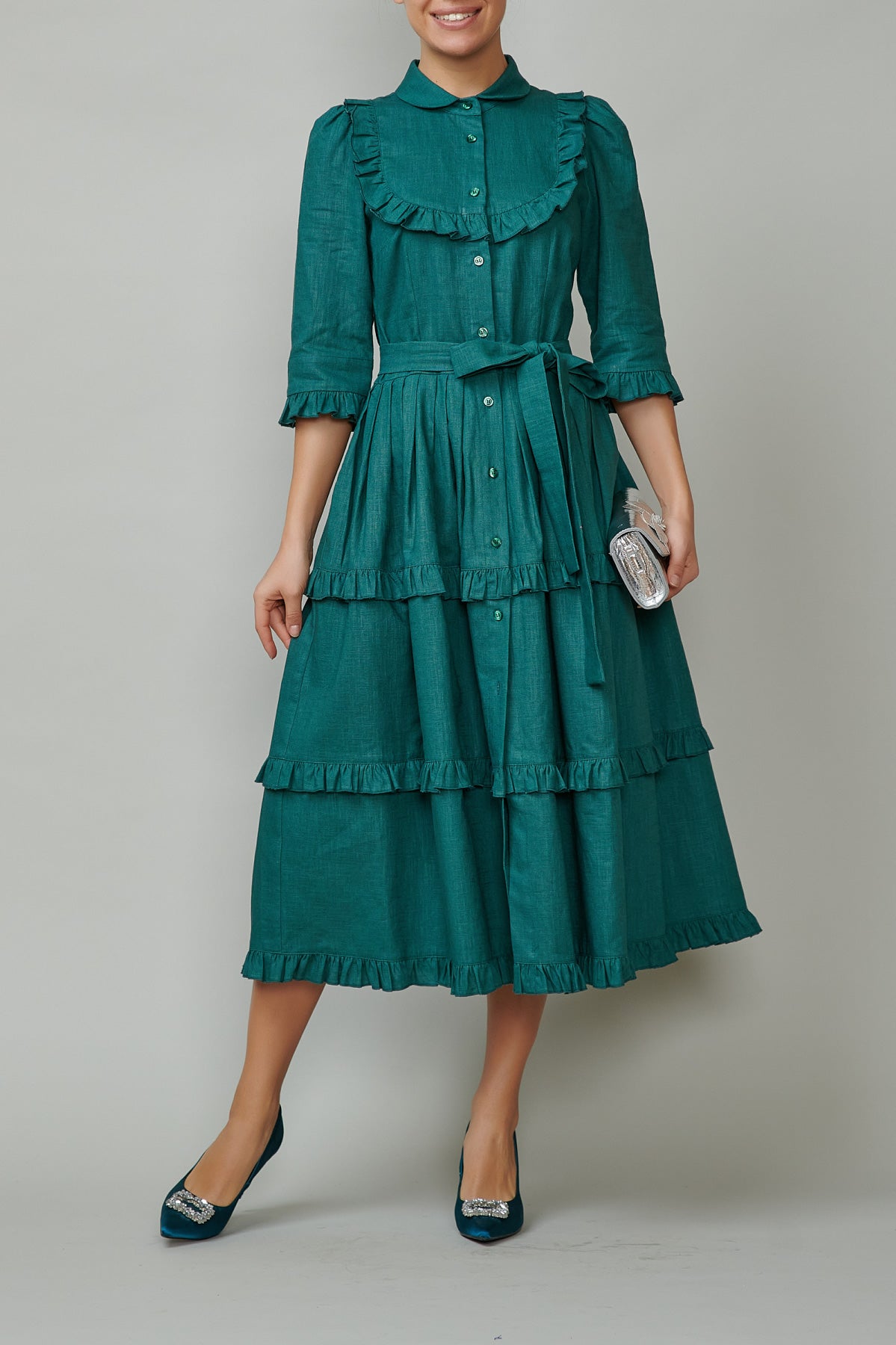 Shirt dress with round placket and frills, made of green linen
