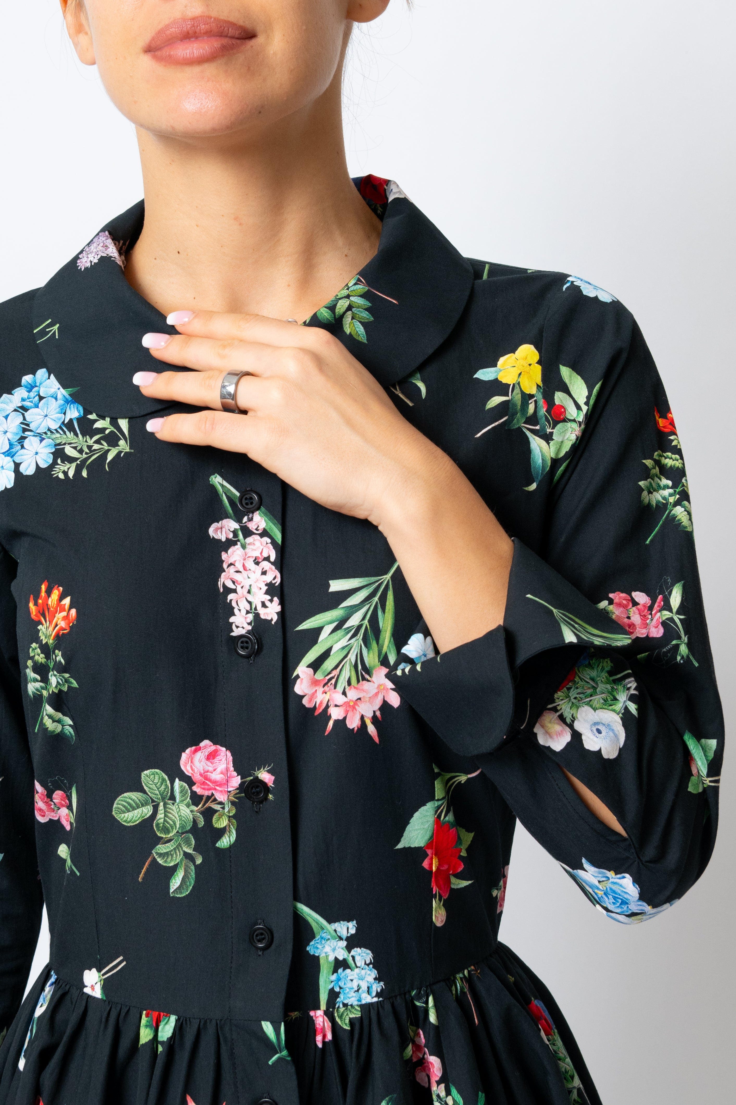 Milla Milla midi dress with floral print on black background – limited edition, available by pre-order only