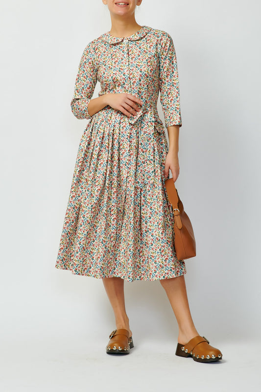 Shirt dress with multicolored flowers on white