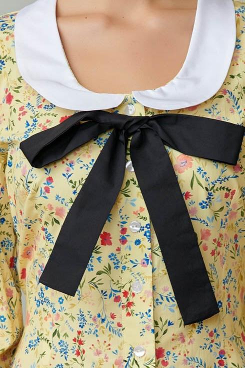 Rochie cu guler alb si funda neagra din poplin cu flori pe galben 